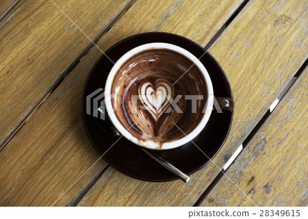 Coffee foam froth art on wooden table 28349615