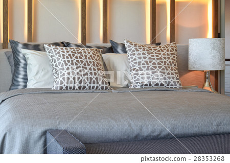 stylish bedroom with brown pillows on bed stylish bedroom with brown pillows on bed 28353268