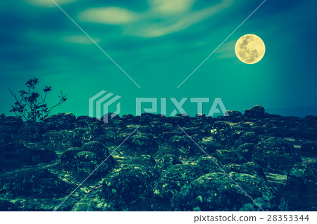 Rocky against blue sky and beautiful full moon. Rocky against blue sky and beautiful full moon. 28353344