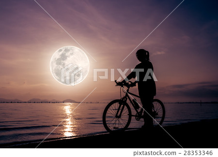 Silhouette of healthy biker-girl enjoying the view Silhouette of healthy biker-girl enjoying the view 28353346