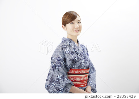 A woman in a yukata A woman in a yukata 28355429