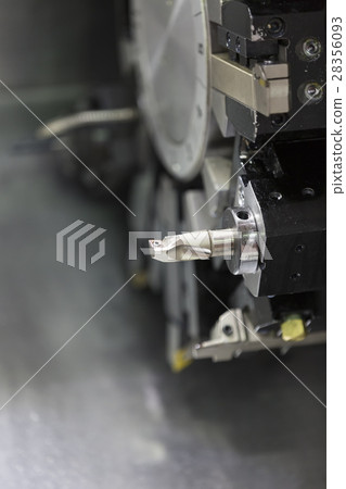 Operator machining automotive part 28356093