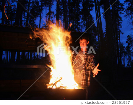 Teenager plays in the wizard, mage fire 28361937