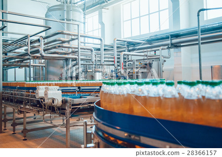 Beer bottles on the conveyor belt. Brewery. Beer bottles on the conveyor belt. Brewery. 28366157