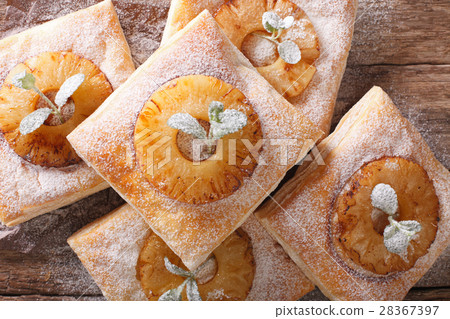 Delicious layer cake with pineapple close-up 28367397