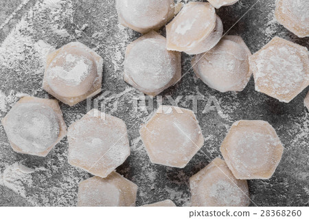 Frozen meat dumplings selective focus. Background 28368260