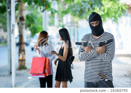 criminal hand holding shot gun woman on street 28368795