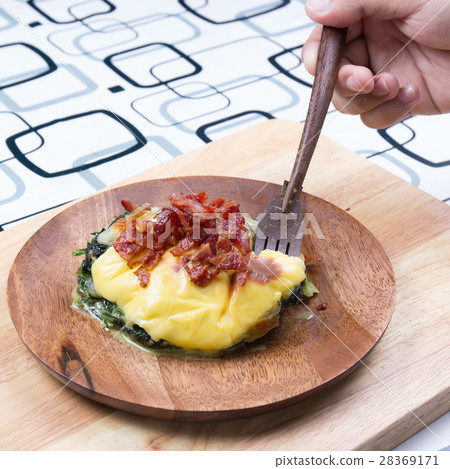 Baked spinach and cheese on plate Baked spinach and cheese on plate 28369171