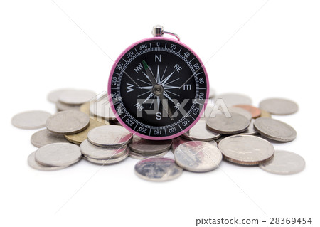 compass and coins on white background 28369454