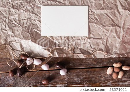 Blank card on parchment with sweets flat lay Blank card on parchment with sweets flat lay 28371021