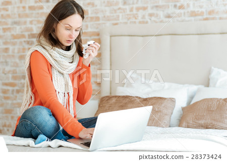 Sick young woman suffering from flu at home 28373424