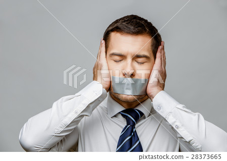 businessman with tape sealed mouth 28373665