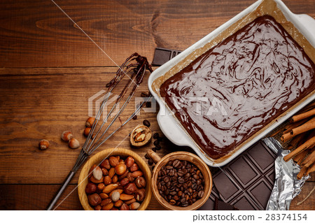 Baking chocolate cake in rural or rustic kitchen. 28374154