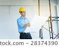 construction engineer hand holding blueprint 28374390