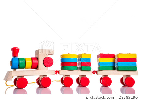 Colorful wooden train toy over white background 28385190