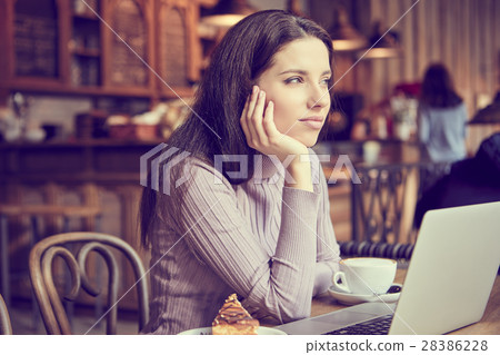 woman working with laptop in cafe. social network concept 28386228