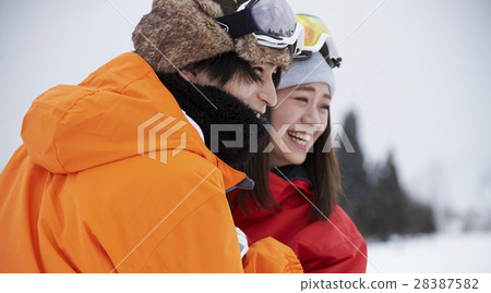 Ski resort couple Ski resort couple 28387582