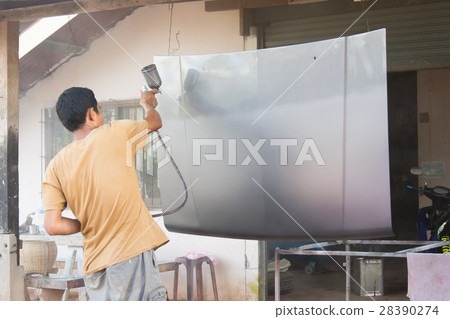 Worker painting grey bonnet Worker painting grey bonnet 28390274