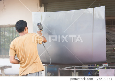 Worker painting grey bonnet Worker painting grey bonnet 28390275