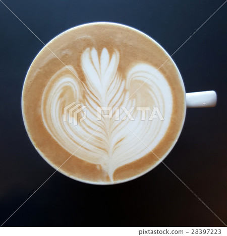 Top view of a mug of latte art coffee. Top view of a mug of latte art coffee. 28397223