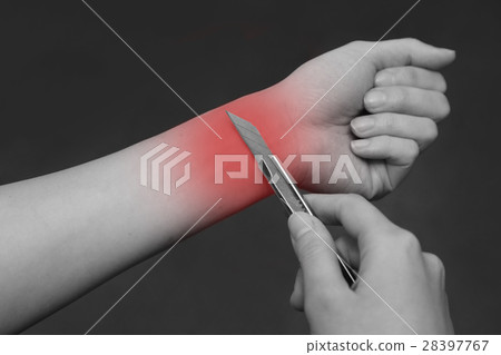 hand attempt to cutting a wrist with a cutter 28397767