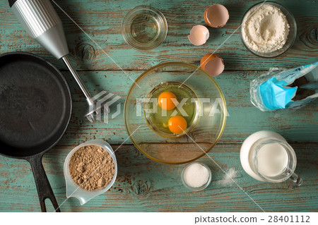 Set for cooking pancakes on the light background Set for cooking pancakes on the light background 28401112