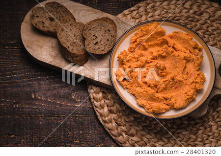 Hummus with bread on the old wooden Hummus with bread on the old wooden 28401320