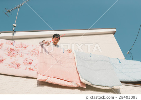 drying a futon, housekeeping, person 28403095