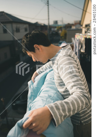 drying a futon, housekeeping, person 28403100