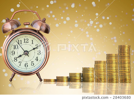 stacks of gold coins step with the vintage clock on Abstract photo of chrismas background, investment and financial concept 28403680