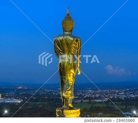 Buddha standing on a mountain at twilight time at Wat Phra That Khao Noi, Nan Province, Thailand, public domain 28403860