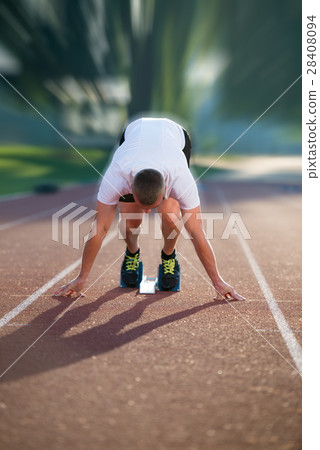 Athletic man on track starting to run. Healthy 28408094