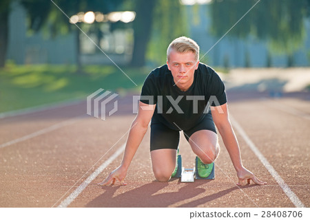 Athletic man on track starting to run. Healthy 28408706