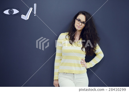 Cheerful young woman with background with drawn Cheerful young woman with background with drawn 28410299