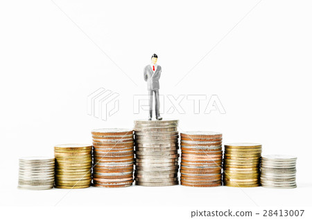Miniature businessman on many stack coins money. 28413007