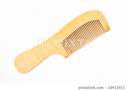 wooden comb on white. 28413011