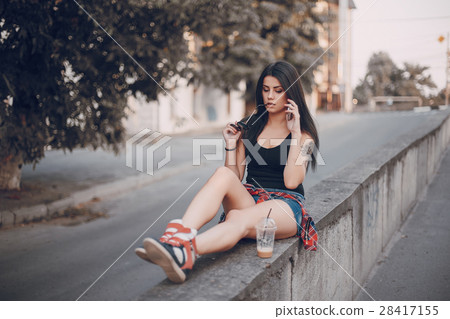 young girl walking in the city young girl walking in the city 28417155