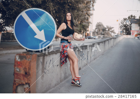 young girl walking in the city young girl walking in the city 28417165