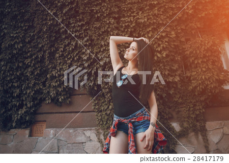 young girl walking in the city young girl walking in the city 28417179
