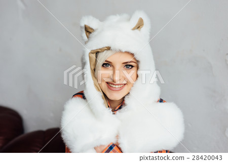 beautiful sexy girl wearing white fur hat 28420043