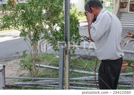 Welder working a welding metal 28422080