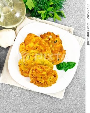 Flapjack chickpeas with zucchini in plate on top Flapjack chickpeas with zucchini in plate on top 28422522