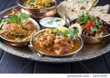 Indian Dishes on traditionel Thali Indian Dishes on traditionel Thali 28423895