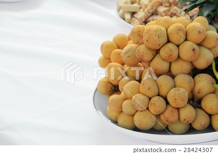southern langsat fruit close up on plate southern langsat fruit close up on plate 28424307