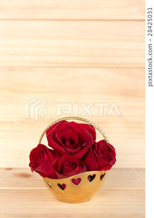 Red rose in gold basket 28425031