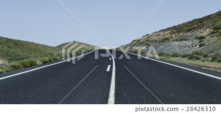 lonely road in a rural landscape lonely road in a rural landscape 28426310