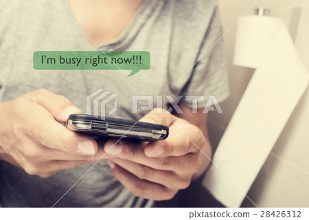 man in the toilet sending a message 28426312