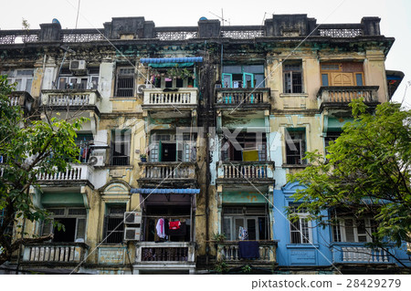 Facade of old apartment in Yangon, Myanmar 28429279