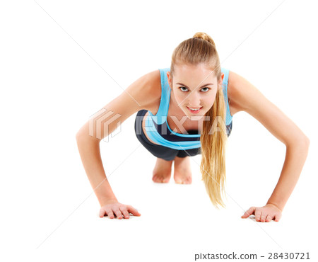 Woman stretching the muscles of her arm Woman stretching the muscles of her arm 28430721