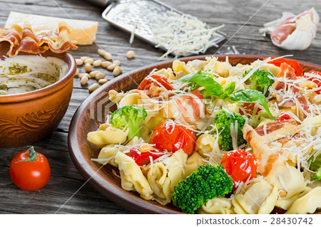 Tortellini with grilled cherry tomatoe Tortellini with grilled cherry tomatoe 28430742